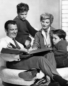 1960 photo of the Cleaver family from the television program Leave it to Beaver. From left: Hugh Beaumont (Ward), Tony Dow (Wally), Barbara Billingsley (June), Jerry Mathers (Theodore AKA "Beaver"). Attribution: By ABC Television (eBay item photo front photo back) [Public domain], via Wikimedia Commons