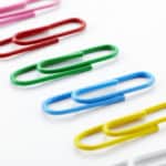 multi color paperclips on white background - Encouraging Letter Writing enclosures blog post