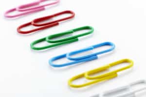 multi color paperclips on white background - Encouraging Letter Writing enclosures blog post