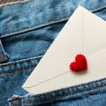 Letters white in jeans pocket. Dreamstime.com for post on Writing Everyday Valentine Letters Year Round